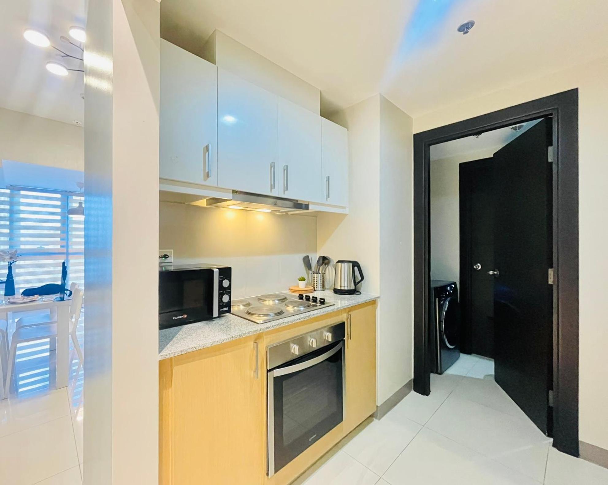 טאגיג Uptown Parksuites Bgc מראה חיצוני תמונה